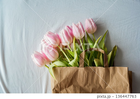 Horizontal View of Pink Tulips in Paper Bag 136447763