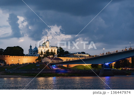 night view of the Novgorod Kremlin, pedestrian bridge over the Volkhov River night view of the Novgorod Kremlin, pedestrian bridge over the Volkhov River 136447974