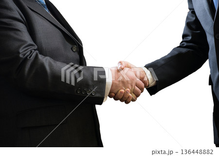 Business handshake of two businessmen in suits isolated on white background Business handshake of two businessmen in suits isolated on white background 136448882
