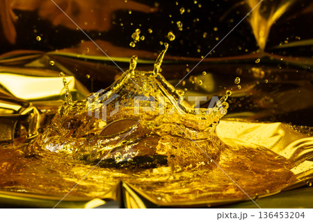 Gold bitcoin cryptocurrency coin create in liquid gold with trust. Golden bitcoin mining from gold and casting into bitcoin coin shape for credit trust new money, crown water liquid 136453204