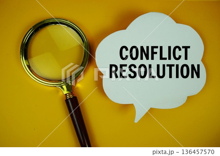 Conflict Resolution text on speech bubble with magnifying glass on yellow background 136457570