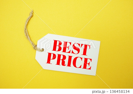 Price tag with "Best Price" is placed on yellow background Price tag with "Best Price" is placed on yellow background 136458134