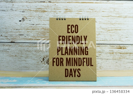 Eco-friendly Planning For Mindful Days Motivational And Inspirational Quotes on wooden background 136458334
