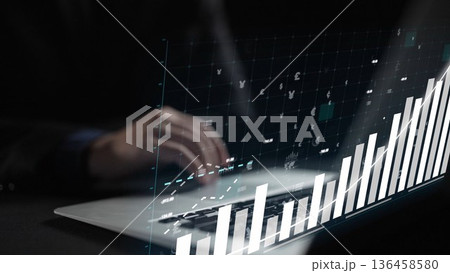 Close-Up of a Business Professional Analyzing Data on a Laptop with Abstract Financial Graphs and Digital Currency Symbols in a Dark Environment Copula Close-Up of a Business Professional Analyzing Data on a Laptop with Abstract Financial Graphs and Digital Currency Symbols in a Dark Environment Copula 136458580