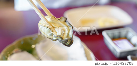 grilled Oyster in Matsushima fish market, seafood famous and popular of Matsushima bay in Miyagi Prefecture, Tohoku, Japan grilled Oyster in Matsushima fish market, seafood famous and popular of Matsushima bay in Miyagi Prefecture, Tohoku, Japan 136458709