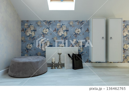 Cozy Bedroom Corner with Ottoman and Decorative Accents Cozy Bedroom Corner with Ottoman and Decorative Accents 136462765