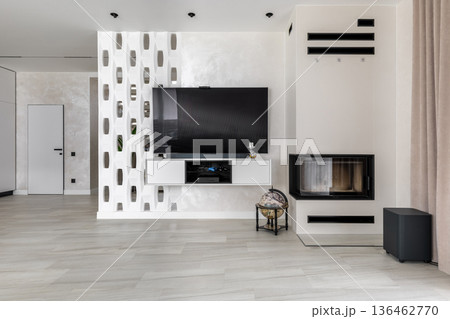 Modern Living Room Interior with TV Zone and Fireplace 136462770