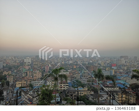 Wide Panoramic View of an Urban Cityscape with Palm Trees and Hazy Horizon Wide Panoramic View of an Urban Cityscape with Palm Trees and Hazy Horizon 136463188