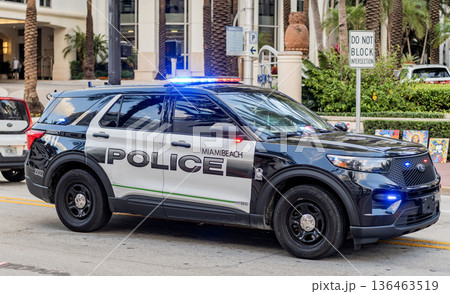 Miami, Florida, USA - November 18, 2024: Ford Interceptor. Police car in the street. Emergency 911 service. Emergency vehicle of police 911. Police car Ford Interceptor in Miami, side view Miami, Florida, USA - November 18, 2024: Ford Interceptor. Police car in the street. Emergency 911 service. Emergency vehicle of police 911. Police car Ford Interceptor in Miami, side view 136463519