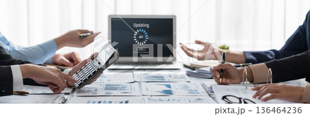 Analyst team working on data analysis dashboard on laptop screen. Insight 136464236