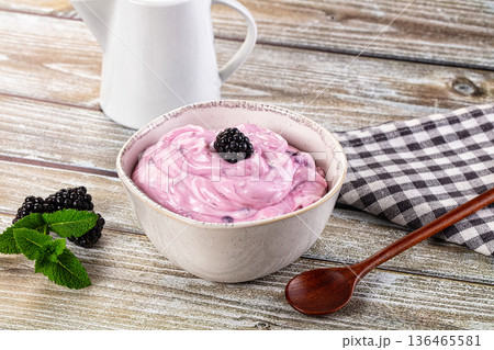 Organic tasty dairy yoghurt with blackberry Organic tasty dairy yoghurt with blackberry 136465581