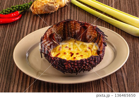 Baked sea urchin with cheese and egg Baked sea urchin with cheese and egg 136465650