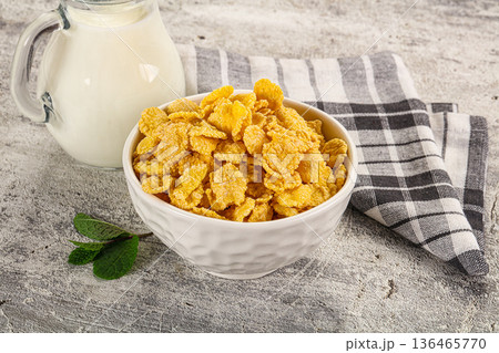 Corn flakes with milk for breakfast Corn flakes with milk for breakfast 136465770