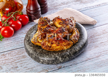 Baked chicken wings with spices Baked chicken wings with spices 136465930