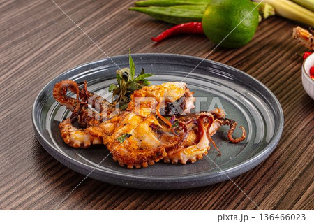 Gourmet grilled whole octopus served lime Gourmet grilled whole octopus served lime 136466023