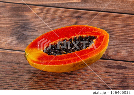 Sweet juicy tropical papaya cut half 136466032