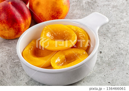 Sweet juicy canned peaches dessert Sweet juicy canned peaches dessert 136466061