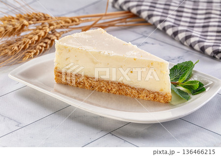Slice of New York classic cheesecake 136466215