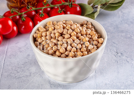 Raw dry chickpeas in the bowl 136466275