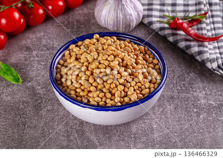 Raw soya beans in the bowl Raw soya beans in the bowl 136466329