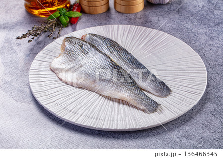 Raw seabass fish fillet for cooking 136466345