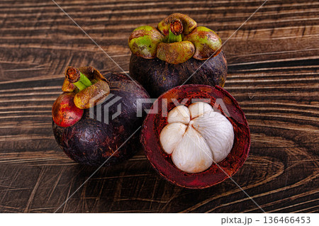 Sweet exotic juicy mangosteen fruit Sweet exotic juicy mangosteen fruit 136466453