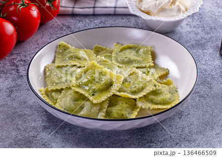 Italian dumplings ravioli with spinach Italian dumplings ravioli with spinach 136466509