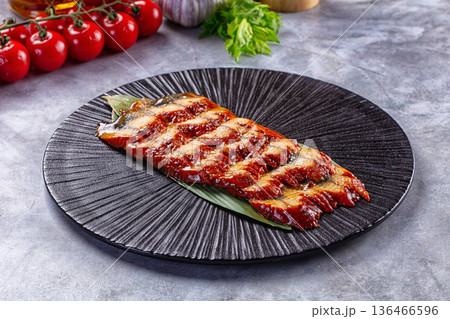 Grilled eel with unagi sauce 136466596