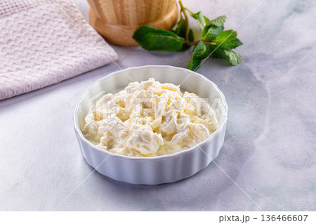Italian soft young stracciatella cheese Italian soft young stracciatella cheese 136466607