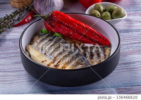 Grilled seabass fillet with ptitim 136466620