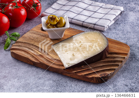 French Gruyere cheese over board French Gruyere cheese over board 136466631