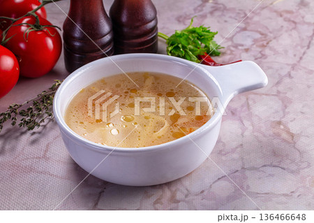 Clear chicken soup with noodles Clear chicken soup with noodles 136466648