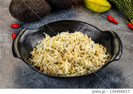 Aromatic Cumin Rice in a Bowl with Exotic Fruits and Vegetables Aromatic Cumin Rice in a Bowl with Exotic Fruits and Vegetables 136466657
