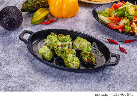 Indian Hariyali Chicken Mint green Tikka Kebab with Fresh Vegetable Salad Indian Hariyali Chicken Mint green Tikka Kebab with Fresh Vegetable Salad 136466673