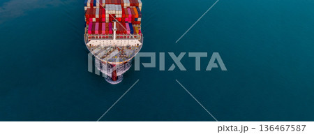 Aerial view container ship carrier container on sea, Global business logistics and Global trade transportation by container ship, Container ship freight shipping import export logistics supply chain. Aerial view container ship carrier container on sea, Global business logistics and Global trade transportation by container ship, Container ship freight shipping import export logistics supply chain. 136467587