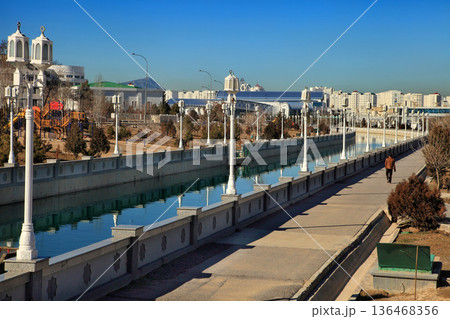ASHGABAT, TURKMENISTAN, January 25, 2017:  Modern architecture of Ashgabat. View of the water channel. ASHGABAT, TURKMENISTAN, January 25, 2017. 136468356