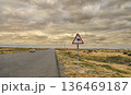 The sign of a camel. On the edge of the road crossing the Karakum desert in Turkmenistan. 136469187