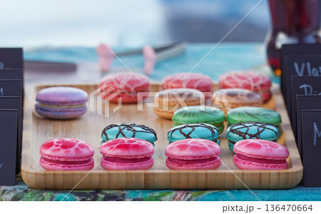 Colorful macarons at farmers market on Naplavka in Prague Colorful macarons at farmers market on Naplavka in Prague 136470664
