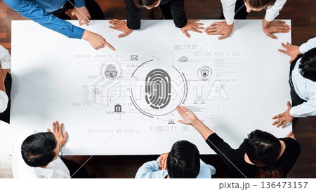 Group of Business Professionals Analyzing Digital Fingerprint Technology on Table in Modern Office Environment with Infographic Elements. Raster 136473157
