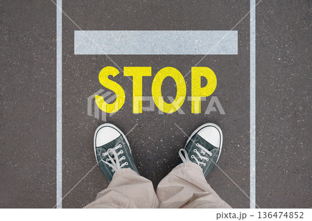 Stop concept - legs with trainer shoes 136474852