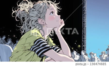 映画や演劇を鑑賞している若い女性