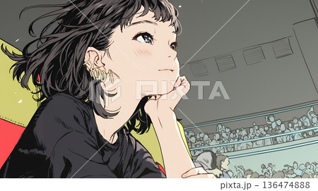 映画や演劇を鑑賞している若い女性