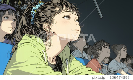 映画や演劇を鑑賞している若い女性