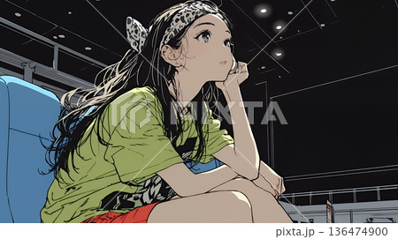 映画や演劇を鑑賞している若い女性