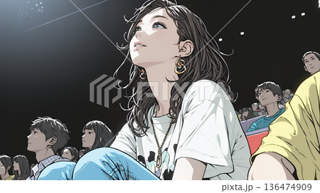 映画や演劇を鑑賞している若い女性