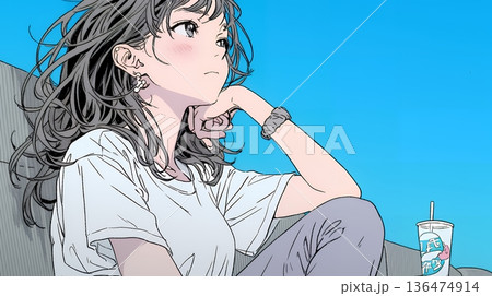 映画や演劇を鑑賞している若い女性