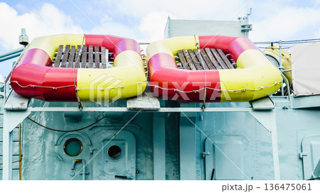 Dinghy lifeboat carried by boat ship. Dinghy lifeboat carried by boat ship. 136475061