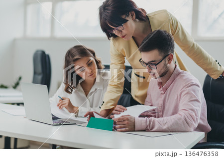 Business team in the office Business team in the office 136476358
