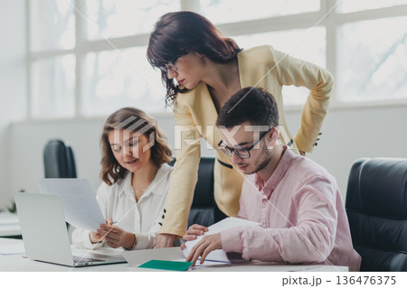 Business team in the office Business team in the office 136476375