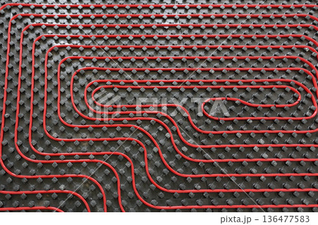 Tubes of radiant underfloor heating installation 136477583
